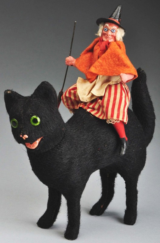 Halloween witch riding black cat candy container, 10in tall, sold at Morphy’s for $4,200 on Sept. 17, 2011. Image courtesy LiveAuctioneers Archive and Morphy Auctions